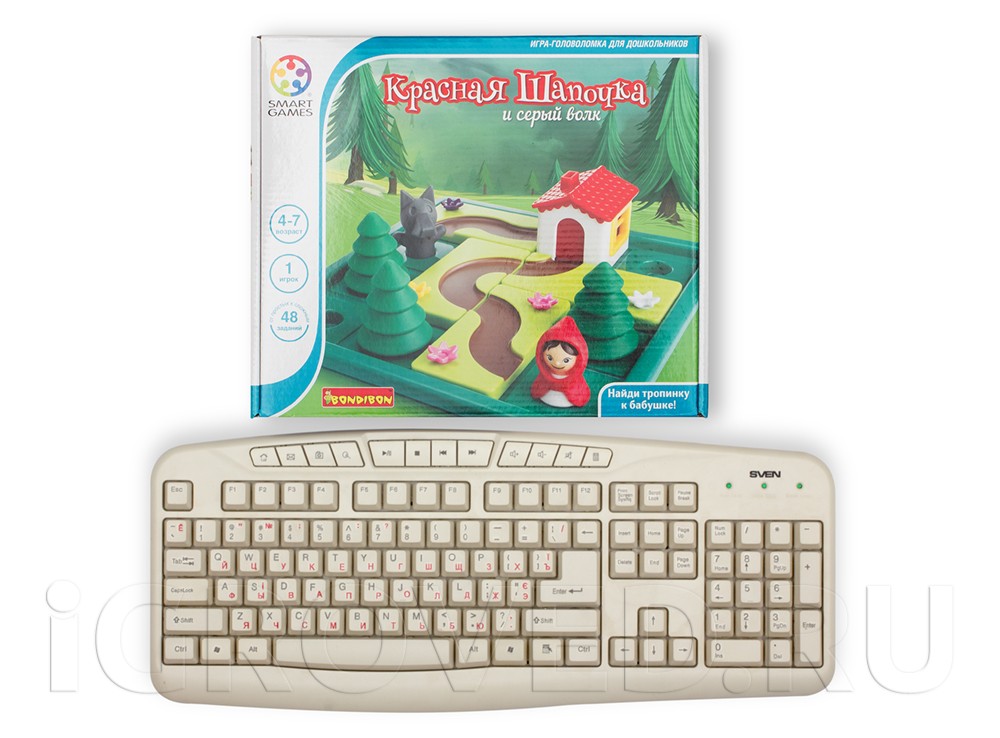 Коробка настольной игры-головоломки Красная Шапочка и Серый волк в сравнении с клавиатурой