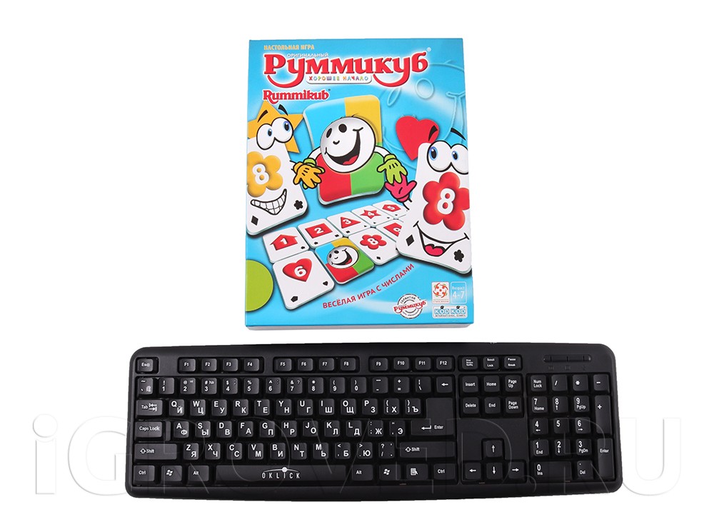 Коробка настольной игры Руммикуб. Хорошее начало в сравнении с клавиатурой