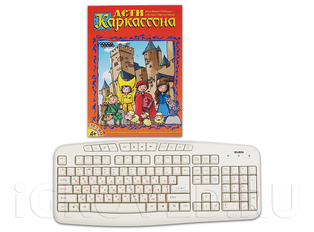 Коробка настольной игры Дети Каркассона в сравнении с клавиатурой